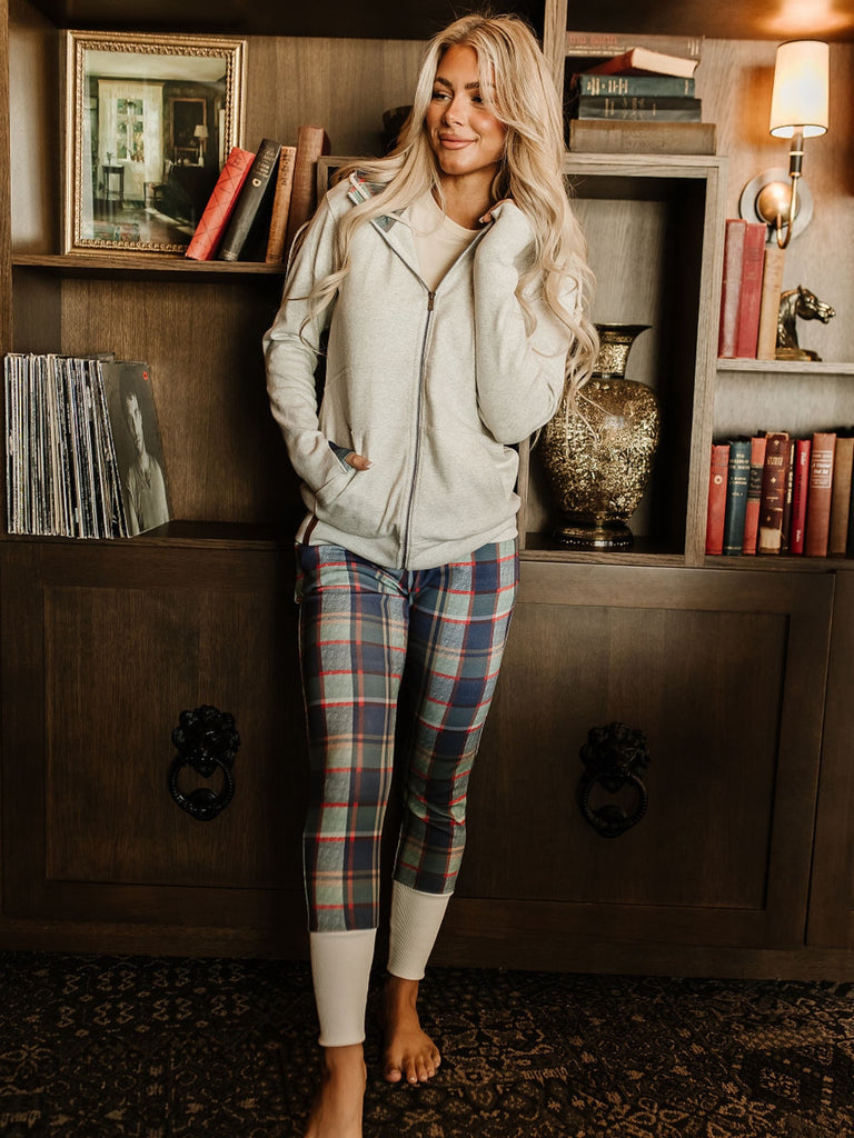 Winter plaid jogger featuring elastic waistband and drawstring secure fit with tapered leg 