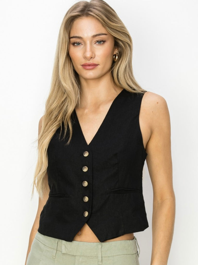 Linen vest with v-neck and button up detail. Available in black or tan.
