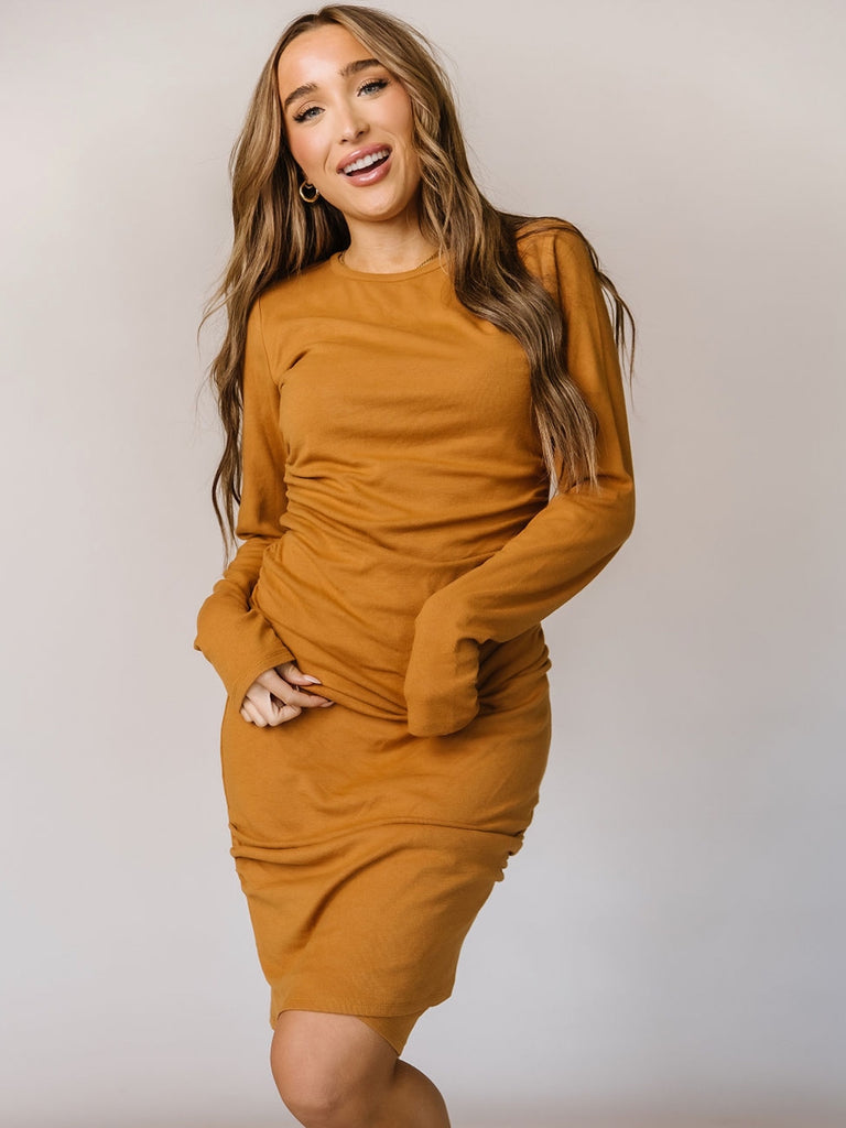 Butterscotch Coloured Long Sleeve comfy Dress with side Ruching Detail to add a little flare.