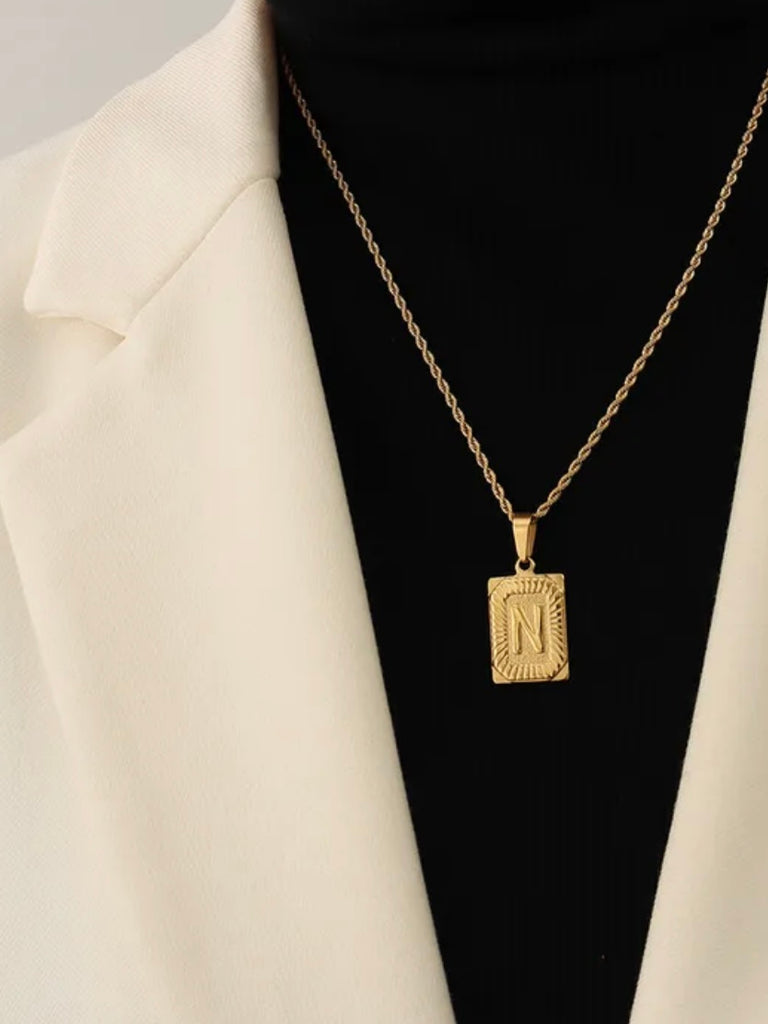 Show your fun playful side with this 18k Gold Plated Initial Tag Necklace. 