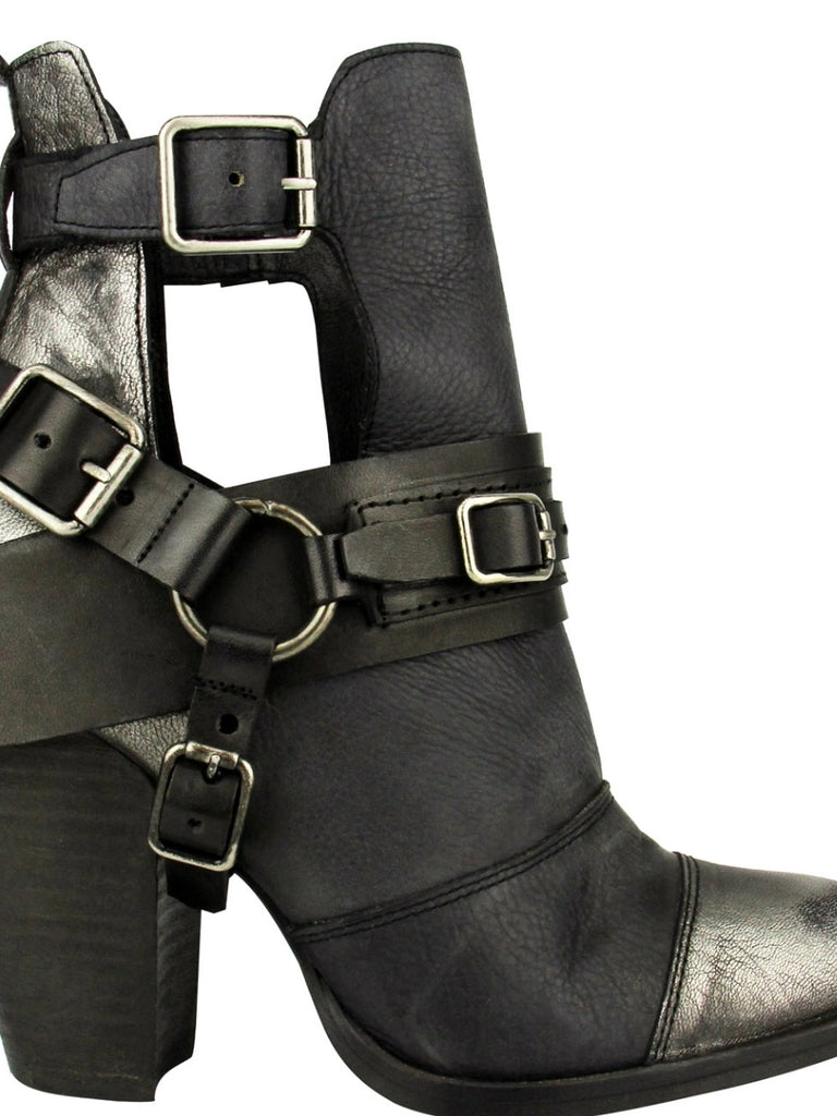 Edgy, Black Stacked 4inch Heel with a touch of Metallic and Silver Buckle Hard wear will get you noticed.