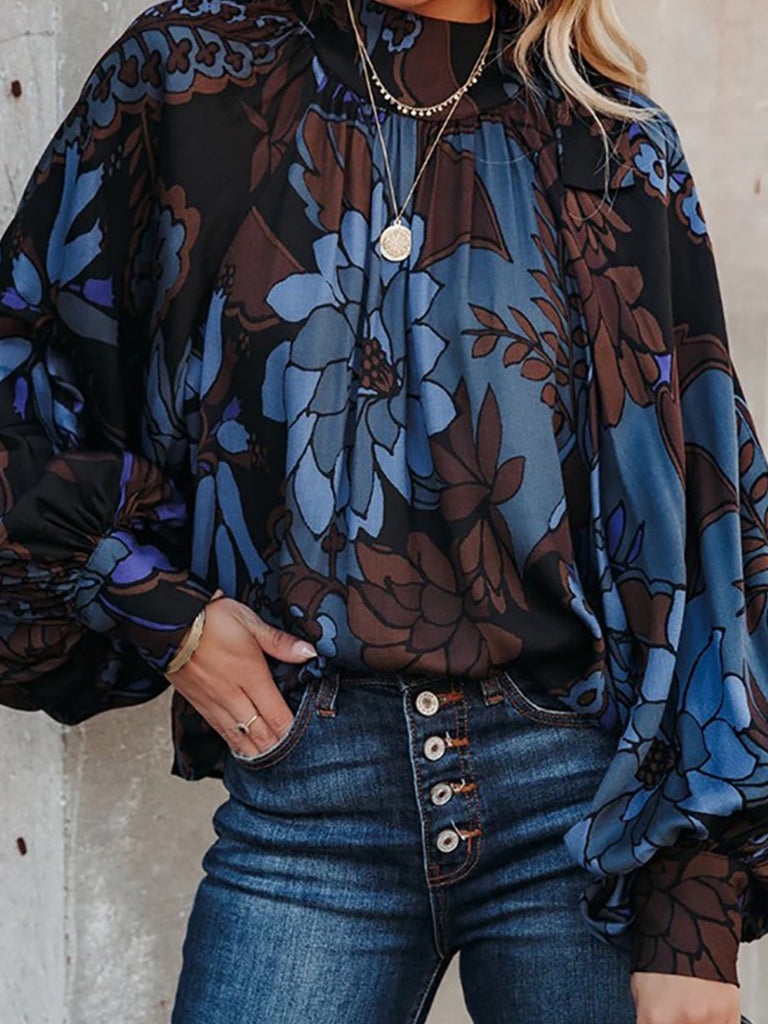 High Neckline Floral Blouse in Black , Brown and Blue colours with relaxed fit  Long Sleeves .