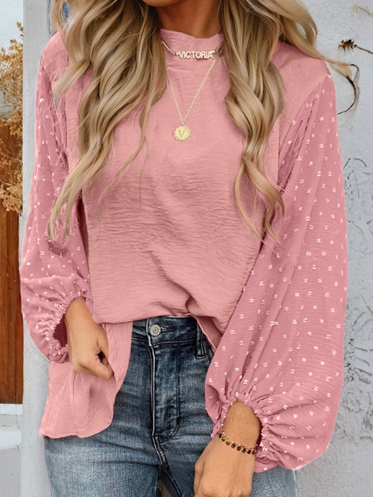 Pink , Balloon Sleeve Top, with a Contrasting Swiss Dot Pattern, and Elegant Keyhole Detailing. The stylish keyhole opening and dainty gold button closure on the back provide a chic finish. 