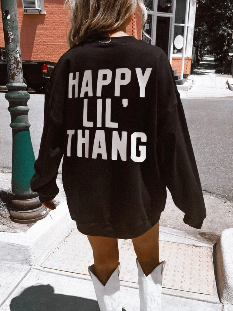 Black relaxed fit sweatshirt. Bold white grapic on the back "Happy LiL' Thang"