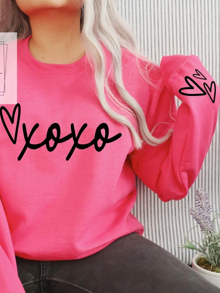 hot pink xoxo sweatshirt for women with hearts on sleeve