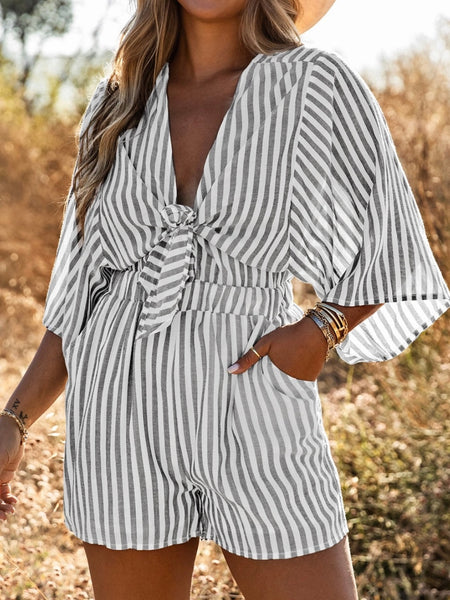 Stripe Romper boasts 3/4 kimono sleeves and a trendy striped  with a tie front .