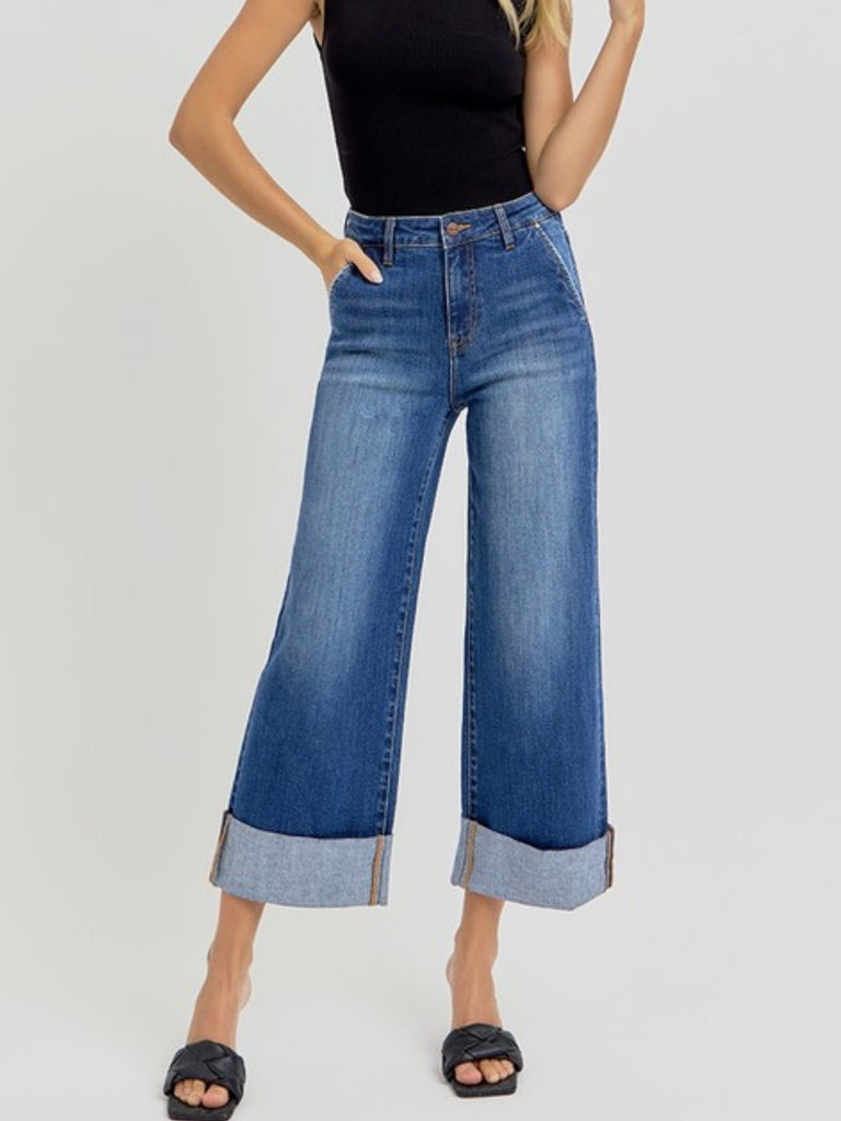 Wide Leg Jeans, with a high rise and wide cuffed ankles,The cotton blend fabric gives a soft, stretchy fit while the ankle length provides a modern touch.