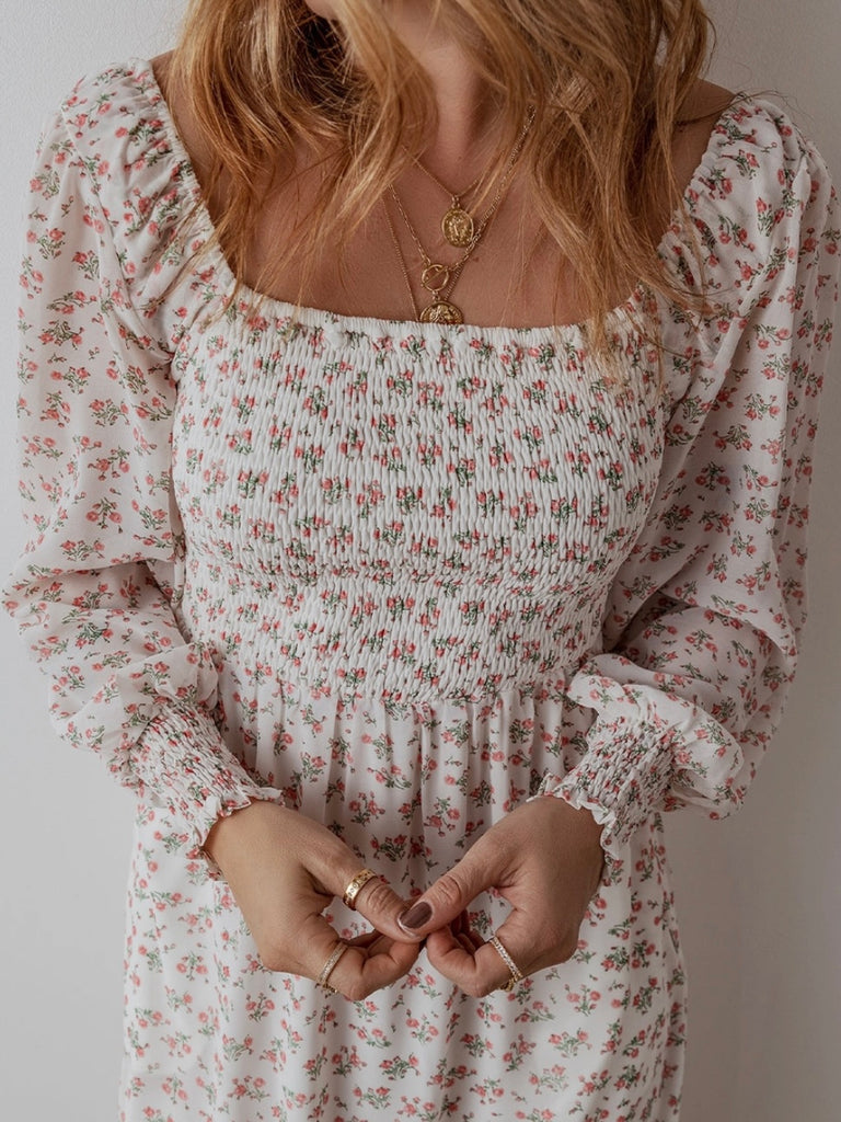 Long Sleeve Smocked  Top Floral Dress, with Square Neckline and Ruffled Hem.