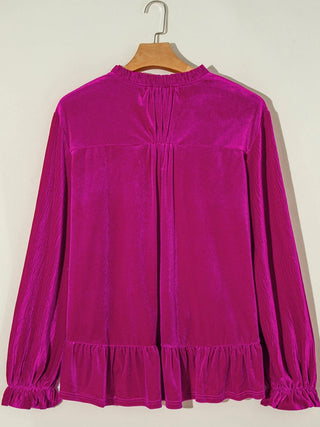  Fuchsia pink velvet Top with ruffled long sleeves and a Drawstring V-Neck neckline.