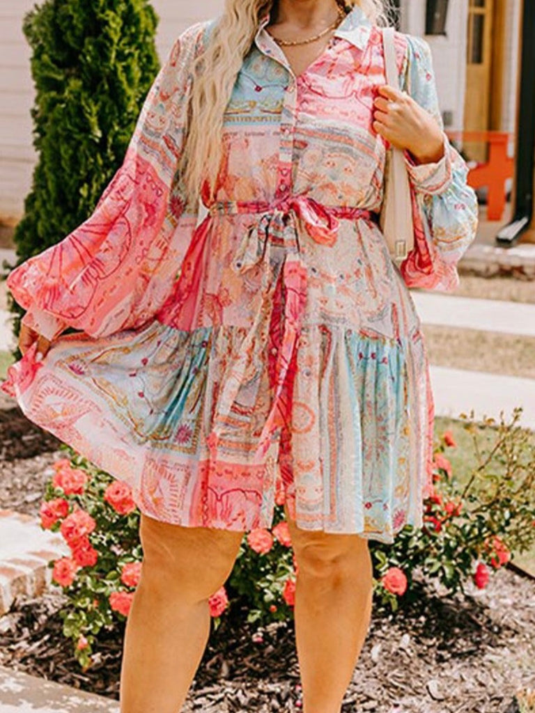 Boho Patches Dress with Bubble Sleeves, Belted Waistline: The belted design cinches your waist, creating a flattering silhouette.
 The colorful blend of patch-style patterns gives the dress a playful yet sophisticated look.