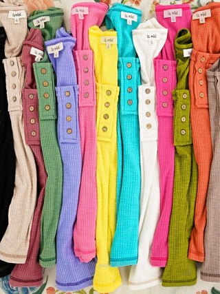 Colourful Array of Front Button, Contrast Stitching detail tanks in cotton, polyester, and spandex.