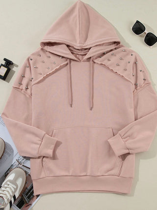 Blush  Stud + Rivet Hoodie , with rivet stud detailing on the shoulders and convenient hood and kangaroo pocket .