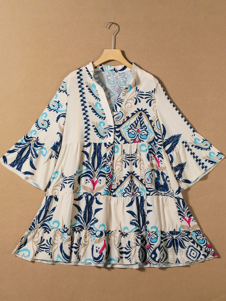 Trendy bracelet sleeves and buttoned design Tunic Dress , Featuring a vibrant blue and magenta tribal print.