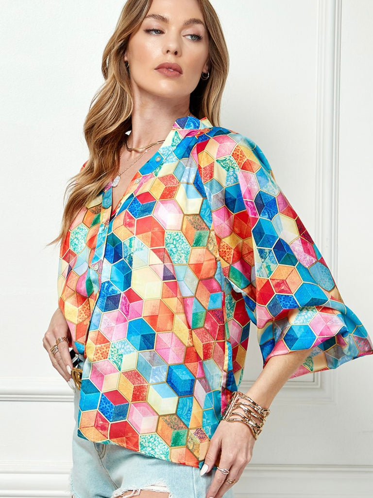 Button down top features a vibrant multicolour box print and 3/4 bubble sleeves , made from 100% Polyester