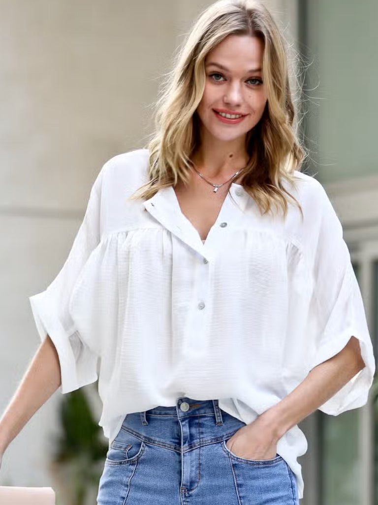 Weston White Blouse features shirring and bat wing detail, boho vibes. Button up loose fitting blouse.