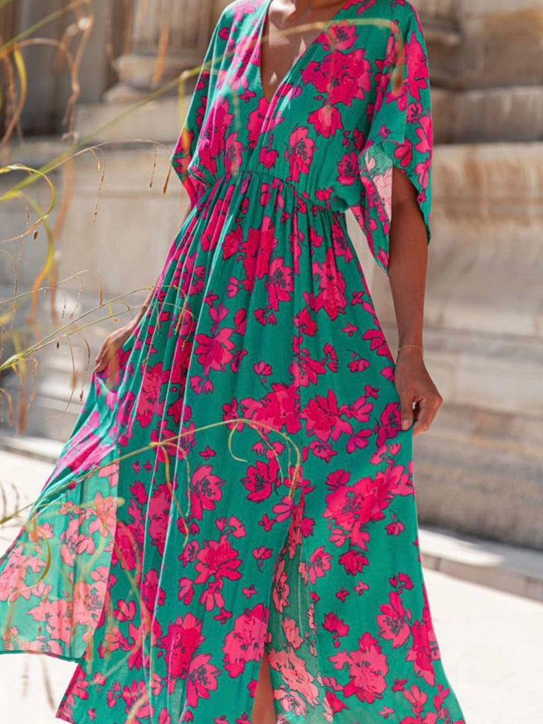  Sea Green hue and vibrant Pink Red floral print Maxi-Dress  with a Flattering v-neck and flutter sleeves and slits at the hemline.