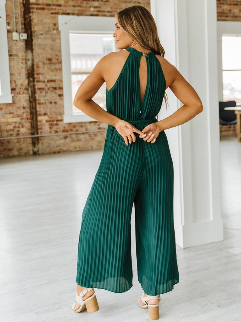 Wide leg , Green Belted Jumpsuit , features a stunning pleated design and a halter neck with keyhole closure.