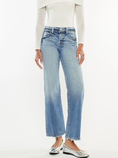 Wide Leg Kancan Jeans features whiskering, minimal distress, 5-pocket style, one button closure, and zip fly.