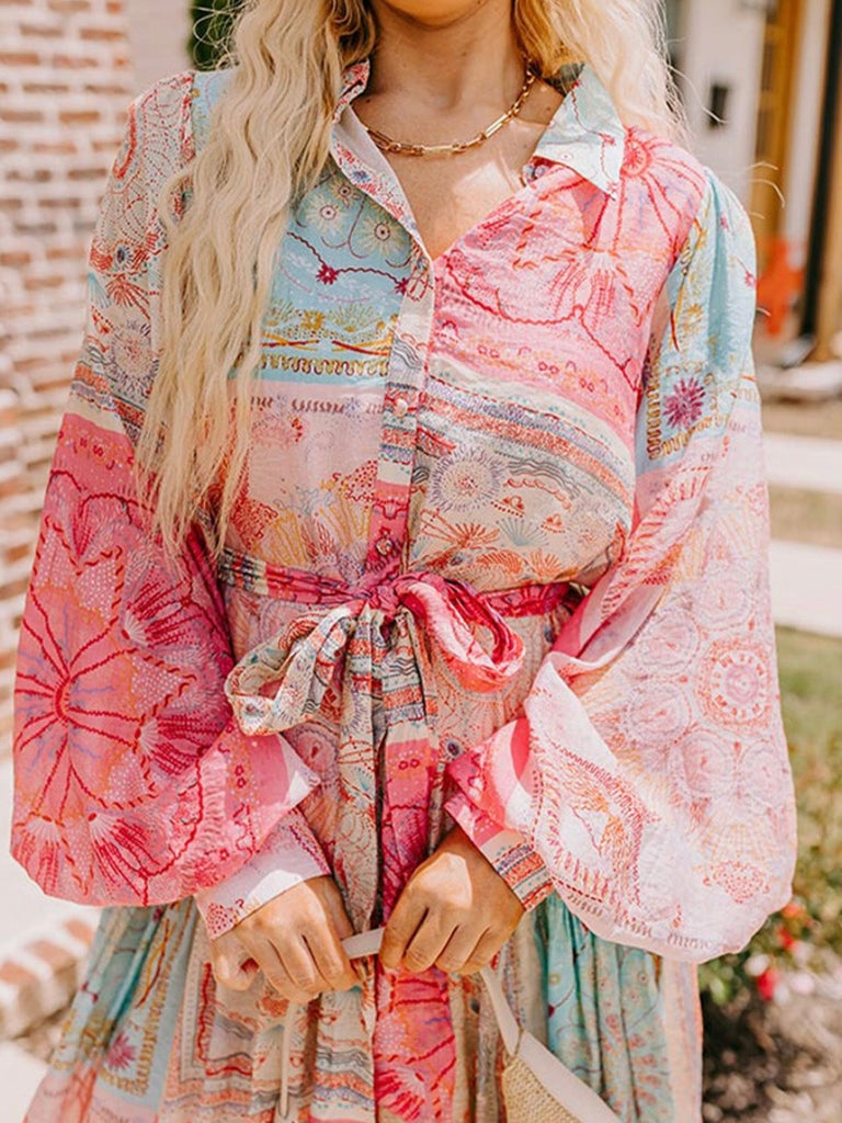 Boho Patches Dress with Bubble Sleeves, Belted Waistline: The belted design cinches your waist, creating a flattering silhouette.
 The colorful blend of patch-style patterns gives the dress a playful yet sophisticated look.