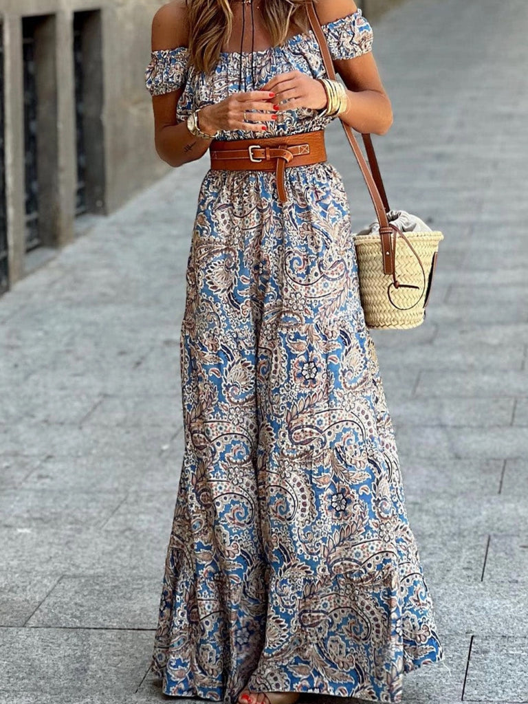 Amelia Boho Paisley Dress. Made with 100% viscose, this maxi dress features a stunning paisley print and flowing silhouette.