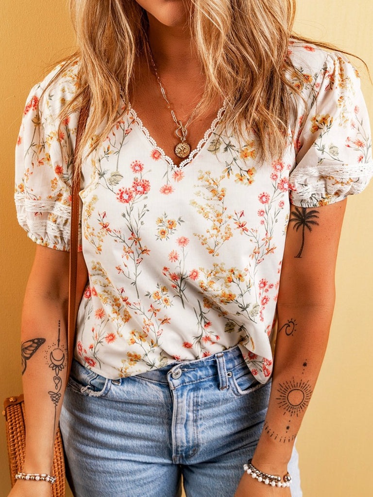 Cute V-Neck Floral Top with a touch of lace .