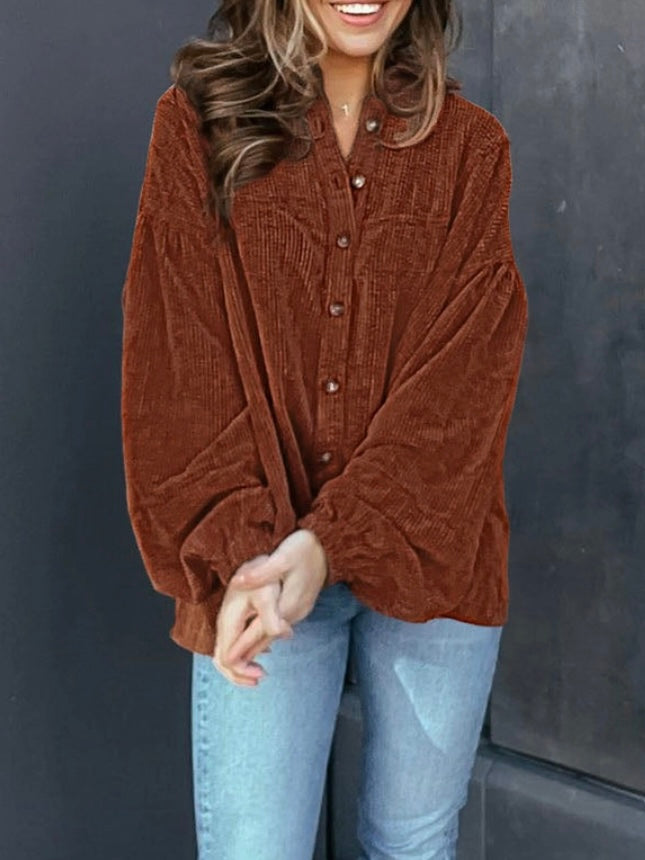 Brown Corduroy Shacket features a trendy oversized fit, with puff sleeves and a pleated back and button front.