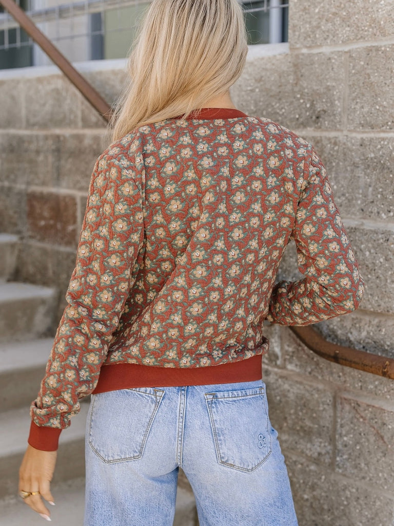 The Citrus Flowerbomber Jacket with cute little flower detail is made with 50% Viscose , 32%Cotton , 15% Polyester , and 3% Spandex material.