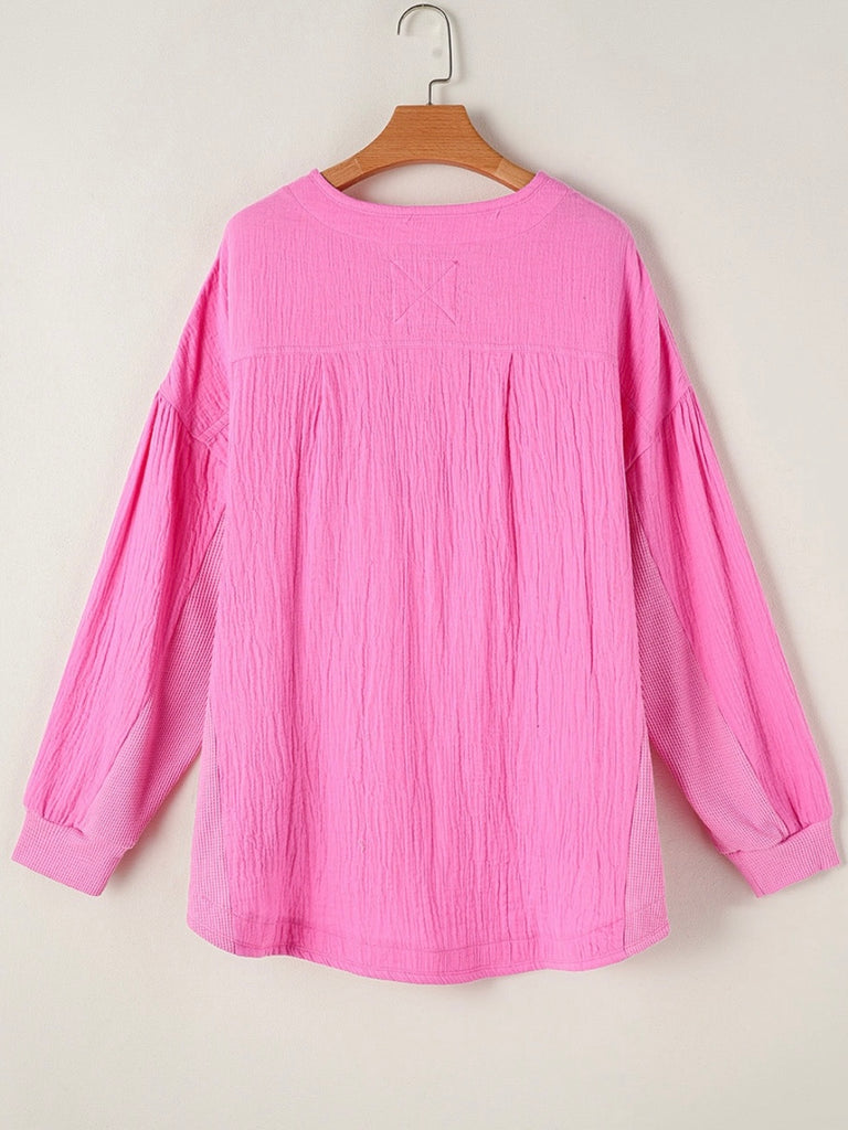 Curvy fit, pink colour, plus-size top with practical chest pockets, and relaxed drop sleeves for an oversized, comfortable fit.