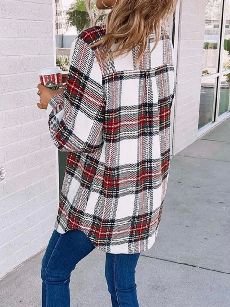  Plaid, button-front closure Shacket in white with red, green, and black accents.