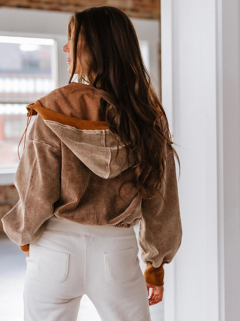 back view of Amber Cord Hoodie in brown corduroy with brown accents.