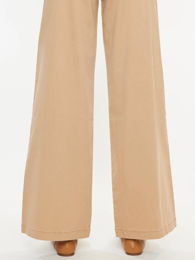 Kancan Chino, featuring a flattering high rise and wide leg, with double button closure and back welt pockets