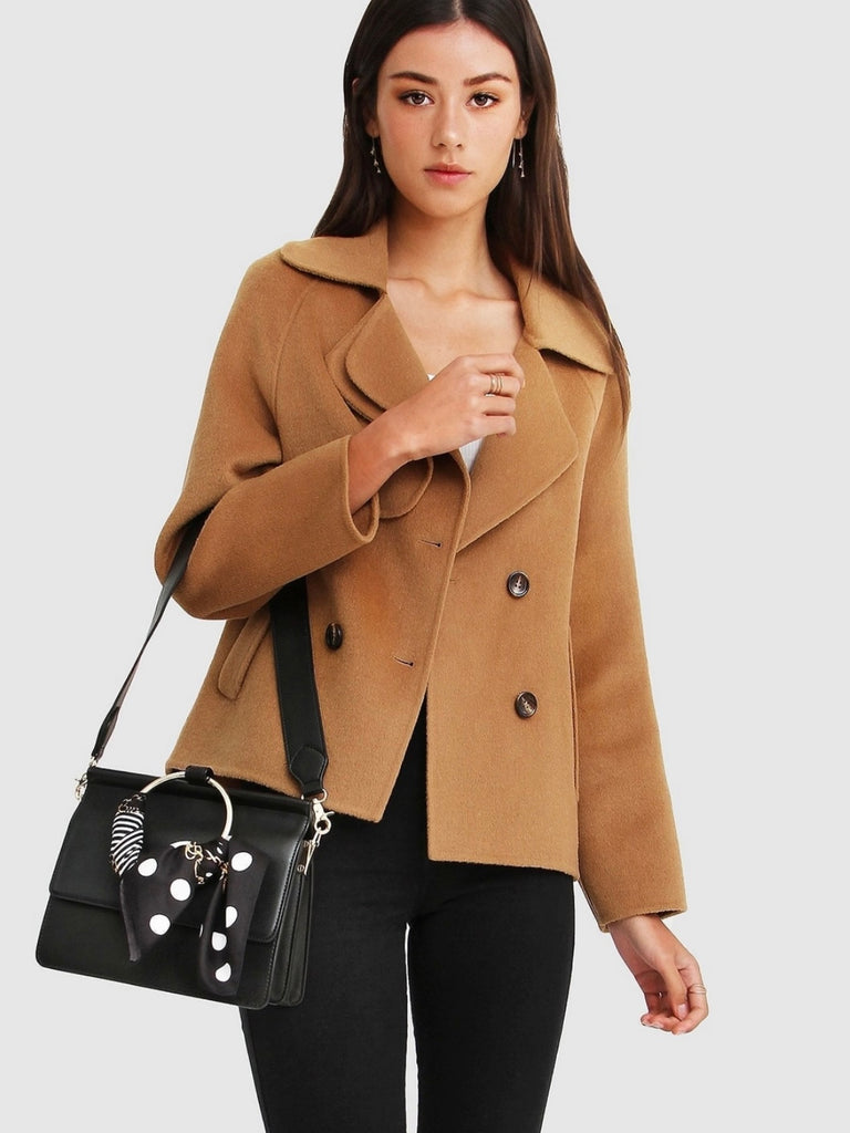 Khaki Wool Blend Peacoat, featuring Oversized, cropped fit with large notch lapels, Double-breasted with flap side pockets and , eye-catching novelty buttons. 