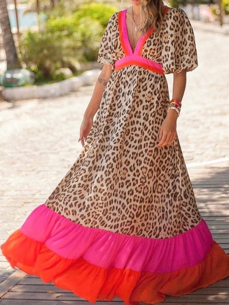 Maxi dress , combines bold leopard print with playful colour block and  dramatic puff sleeves and  a V-neckline.