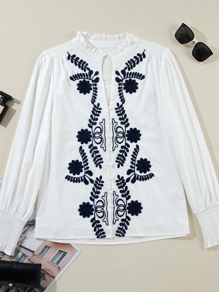 White and Black Floral Embroidery Top, Featuring a Frilled Collar and  Shirred Sleeves with Button Front.
