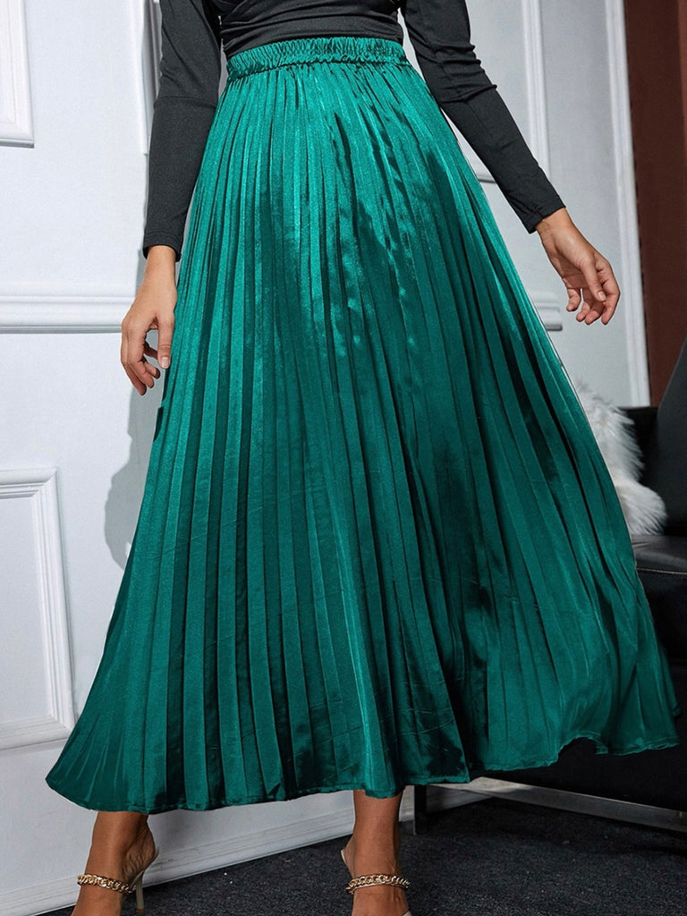 Emerald green satin pleated skirt. High waisted elastic waist band. Lightly lined.