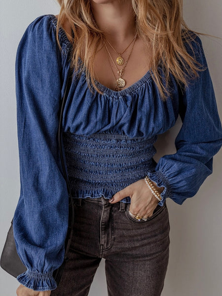 Denim Smocked Top,Ruffled puff sleeves with  a V-neck and elastic neckline.