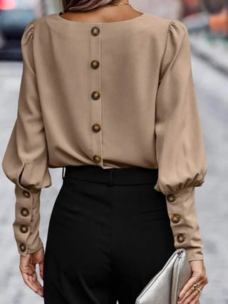 Mocha brown puffed sleeved blouse with back button detail. 