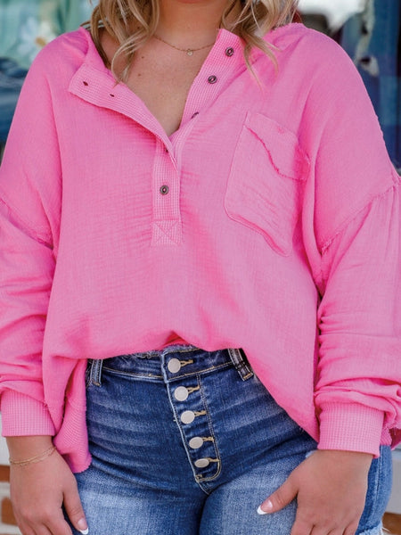 Curvy fit, pink colour, plus-size top with practical chest pockets, and relaxed drop sleeves for an oversized, comfortable fit.