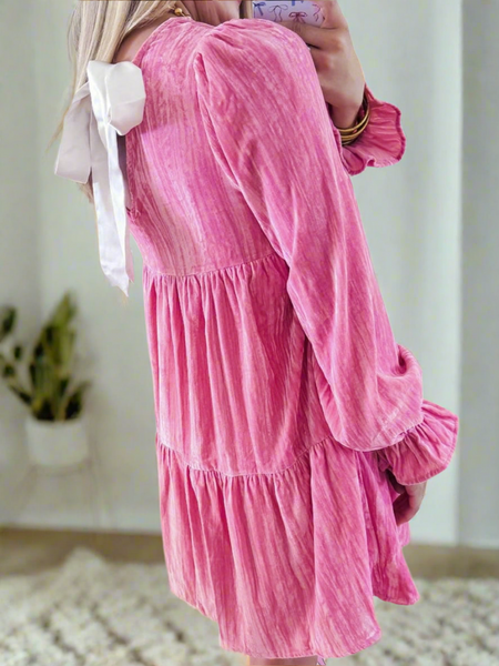 Blush Pink Velvet Dress,  white ribbon, that ties in a bow at back and tiered ruffles with flouncy sleeves .