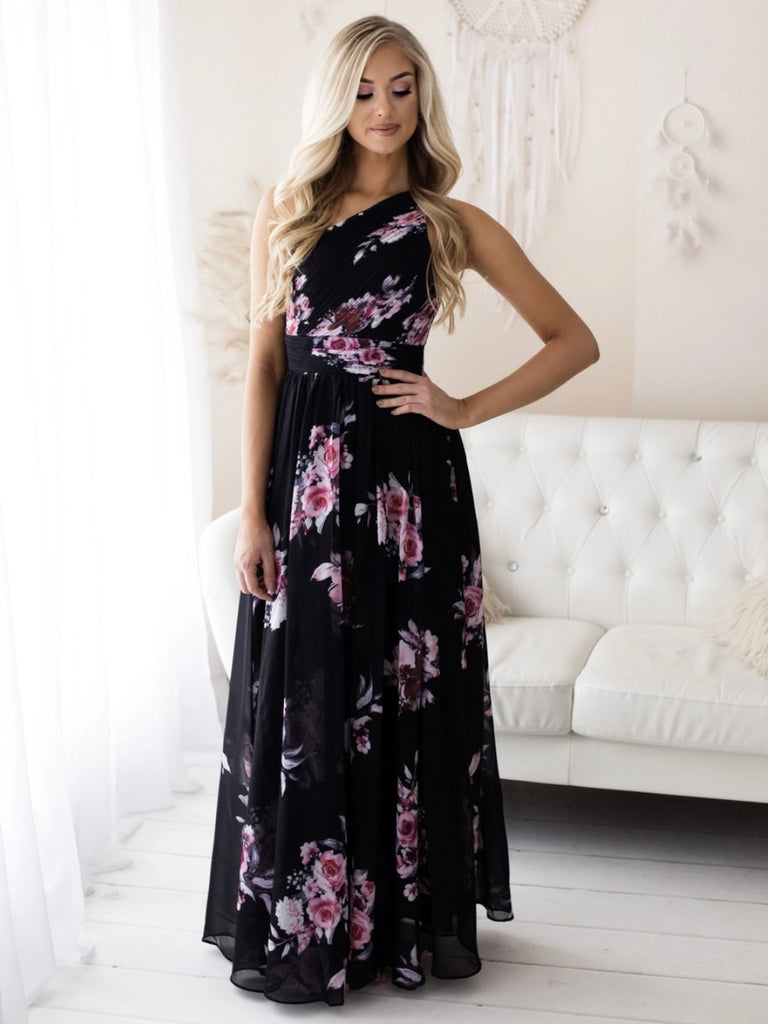  Black Chasing Petals Modern length Floral Maxi-Dress with its fun one -shoulder style. 