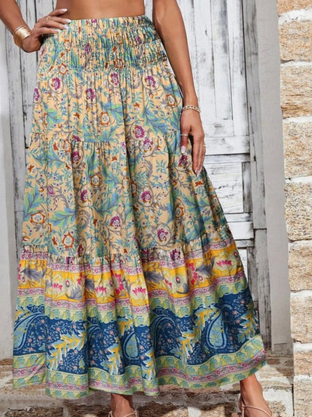 Crafted from 100% viscose, Maxi Skirt Featuring a smocked waistband  vibrant blend of yellow, blue, green, and magenta 