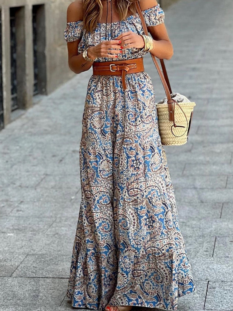 Amelia Boho Paisley Dress. Made with 100% viscose, this maxi dress features a stunning paisley print and flowing silhouette.