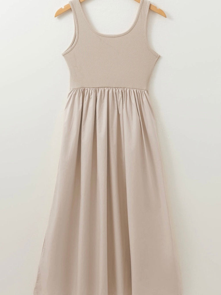Boho style neutral dress with scoop neckline and relaxed pleated fit