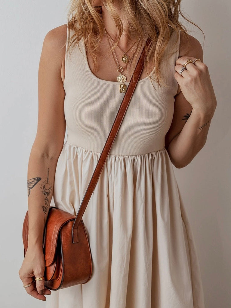 Casual neutral midi dress perfect for beach vacations and boho weddings