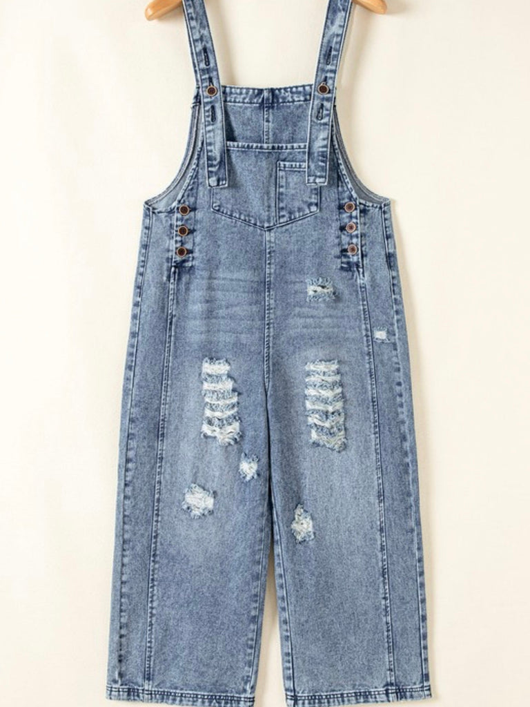 Front view of wide leg denim overalls with distressed details, flat lay