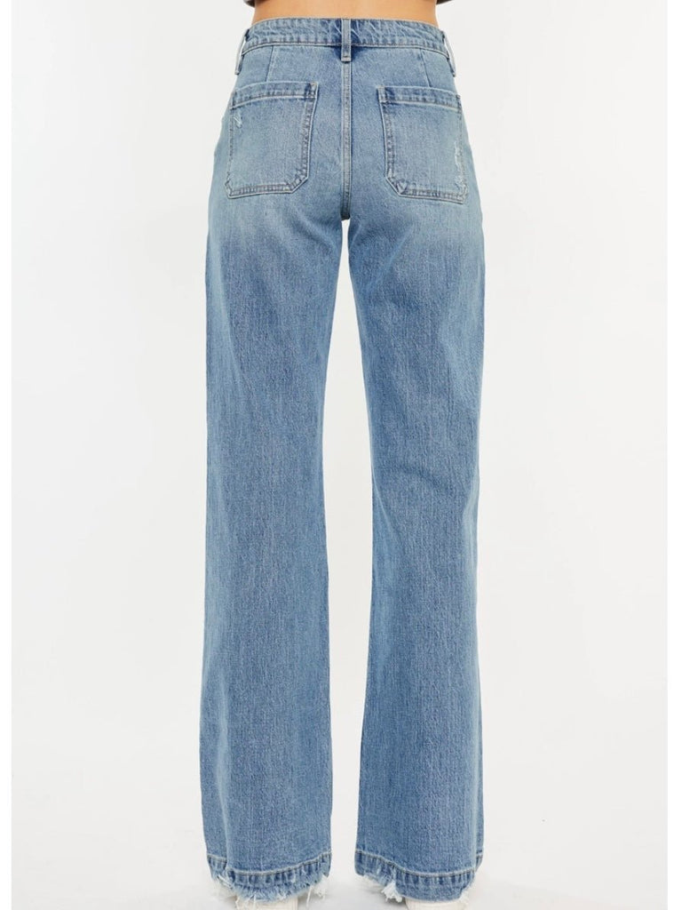 kancan jeans for women with wide pockets on the front and a flare leg