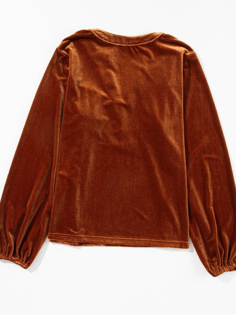 Copper ,Split v-neck Velvet Top with a Relaxed fit, and Lantern sleeves with elegant beaded details.