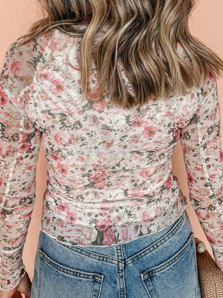  Floral Mesh Top with a high neck, mesh fabric and white with delicate pink floral print.
