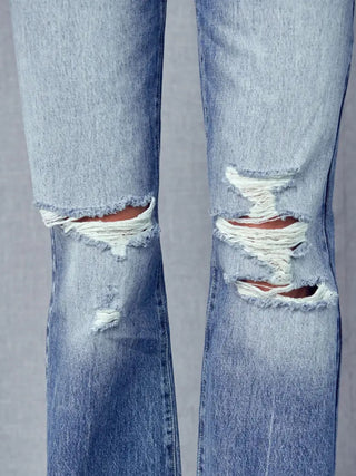 Distressed at knee , with 5 piece button front and Wide Retro Flare Leg Jeans.