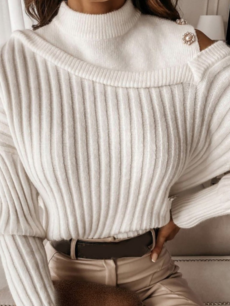 High neck white ribbed sweater with cut out shoulder and pearl detailing